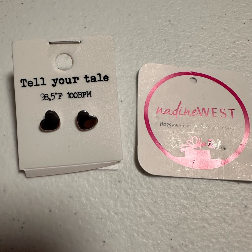 Never worn jewelry. Heart shaped studs, and heart necklace. Silver accessories. - Picture 1 of 2